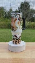 Load and play video in Gallery viewer, Highland Cow 40oz Tumbler